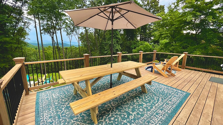 Upstairs outdoor eating area that seats 8. Downstairs wrought iron table that seats four.