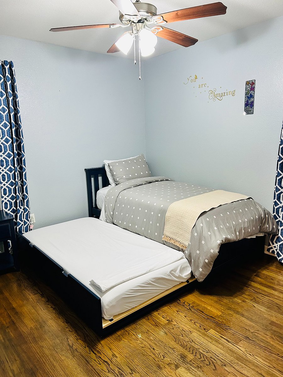 " Family-Friendly Comfort! This cozy bedroom features a convenient pull-out bed for extra guests and a pack-and-play for your little oneperfect for restful nights and sweet dreams.