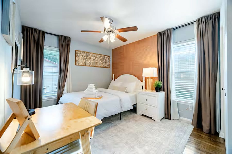 Third bedroom featuring a workspace with high-speed Wi-Fi and plenty of natural lightthe perfect quiet zone for remote work or study.