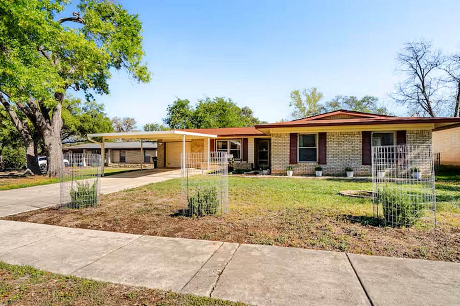 Beautiful front yard and exterior of our single-story home, situated on a peaceful street with easy access to local amenities and hospitals.