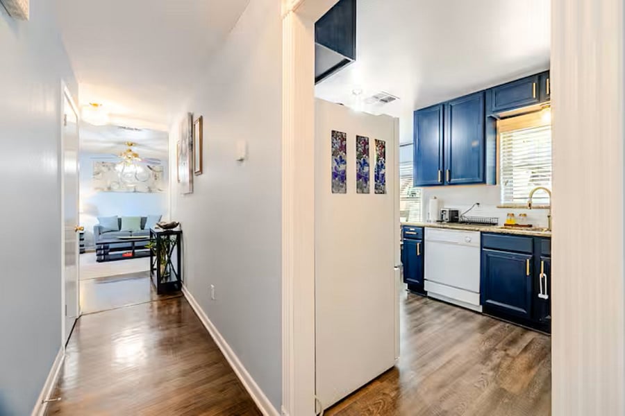 An inviting open-concept layout connecting the kitchen and dining areas directly to the living roomperfect for staying connected while cooking or relaxing."