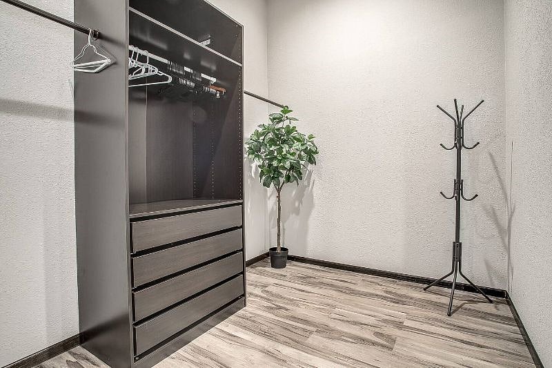 Massive walk in closet in master bedroom