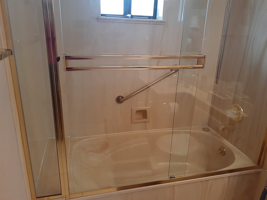 Bathtub is larger than most apartment combo bath & shower stalls.