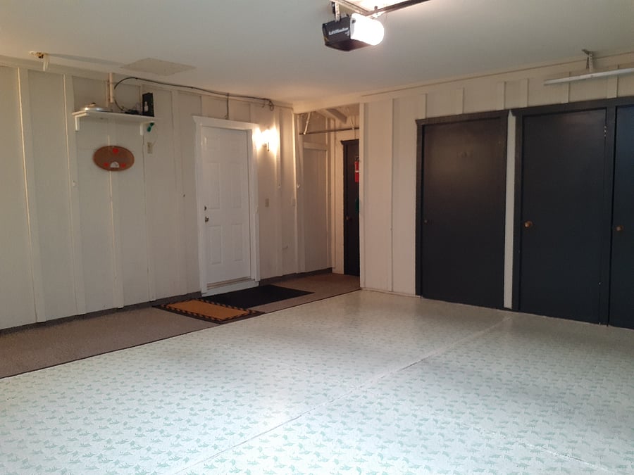 Parking place in enclosed garage.