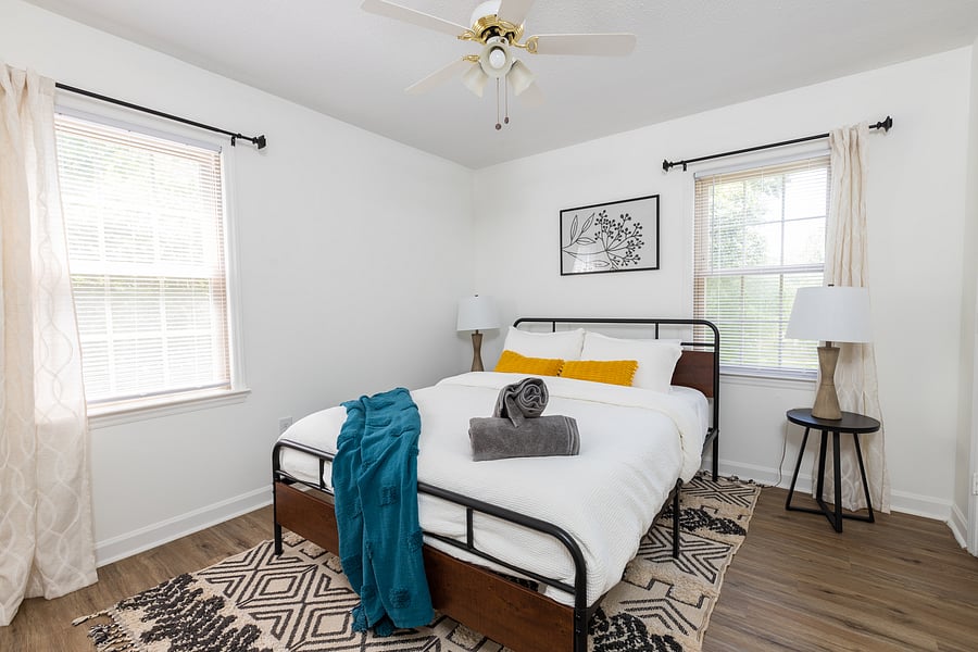 Relax in this quiet queen bedroom oasis
