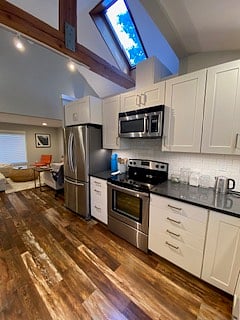 full kitchen with staples like sugar, flour, tea, and starter coffee.
