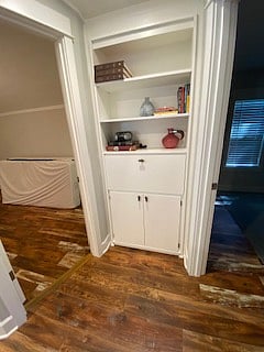 book shelf has pull down desk