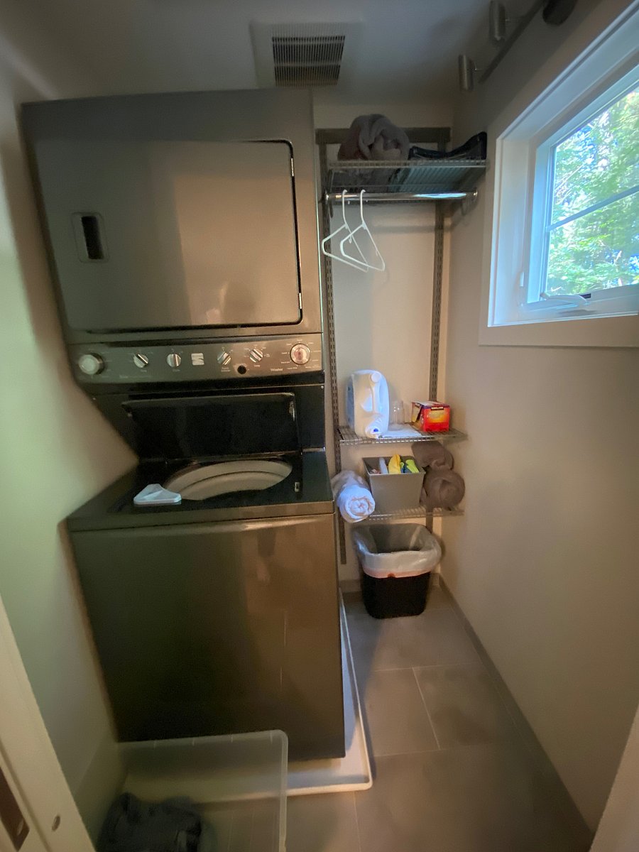 Laundry room with W/D with place to hang cloths.