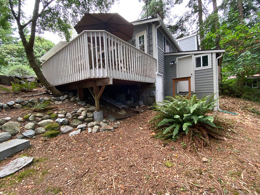 Back yard with storage shed.