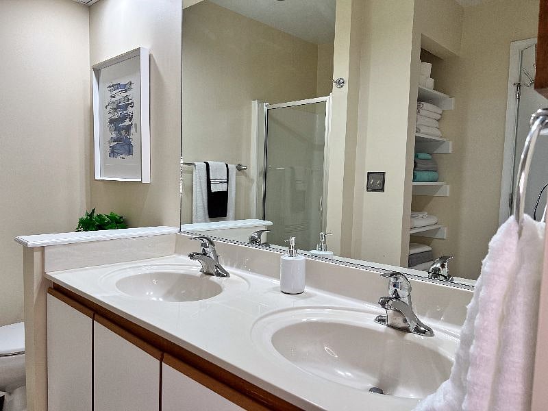 Master Bath: Walk-in Shower, Dual Sinks, Shelving, Closet