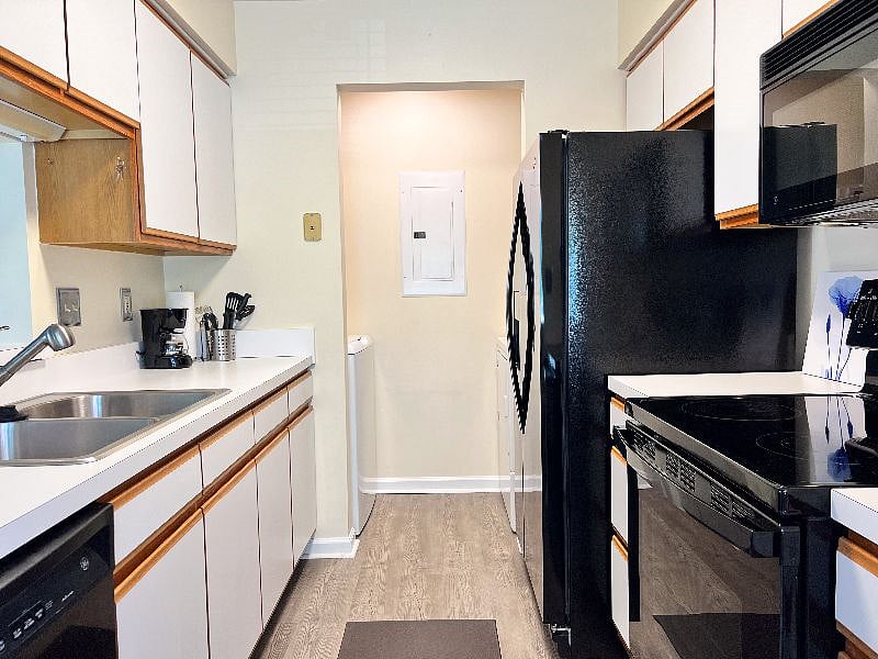 Kitchen view from dinette to washer/dryer area.