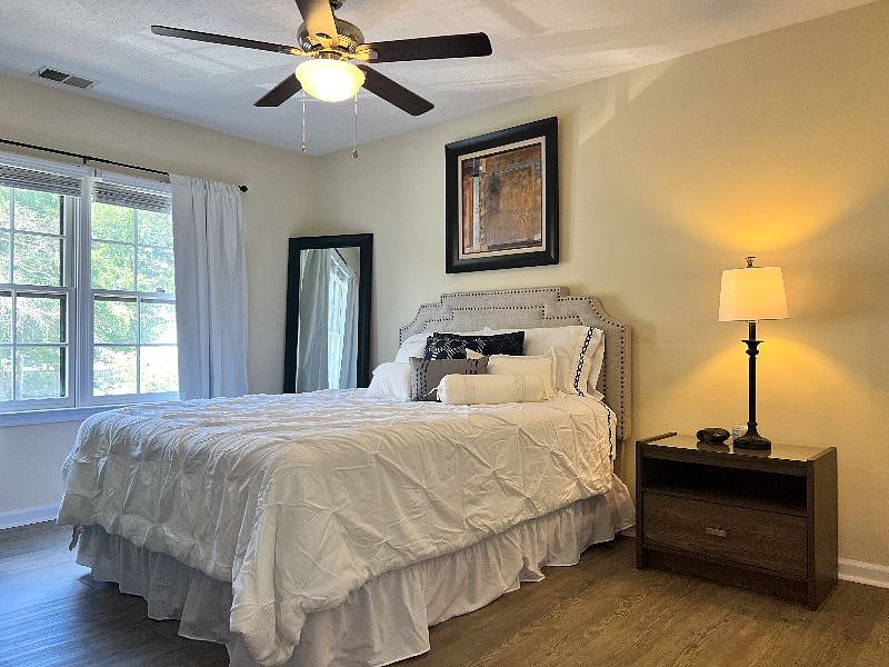 Master Bedroom: Queen Size Bed, Credenza, Nightstand, TV, Closet