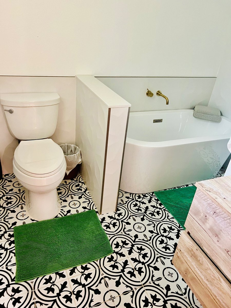 Primary bathroom includes shower and bath tub 