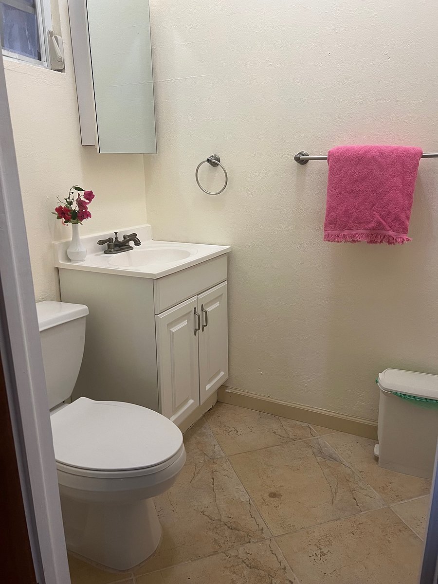1/2 bath w/ storage and medicine cabinet