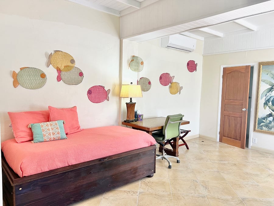 Extra large living room includes a desk and day bed (twin bed) w/ easy access to 1/2 bath