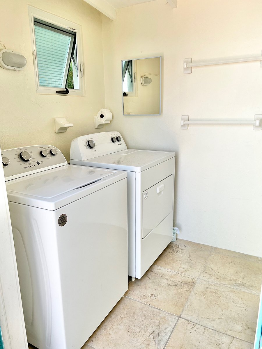 There is an stand alone OUTDOOR bldg off the patio area is shared w/ the Studio.
This bldg contains a washer / dryer and Shower/Toilet