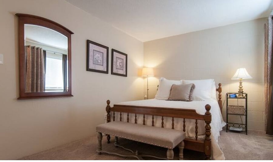 Queen bed. Room for play and pak for infants, which is stored in closet.