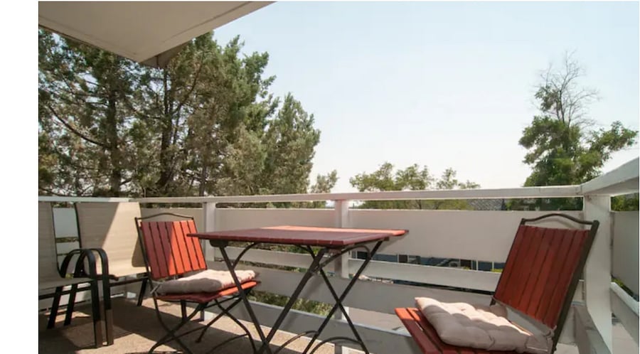 Enjoy beverages on the balcony with views of mountains.