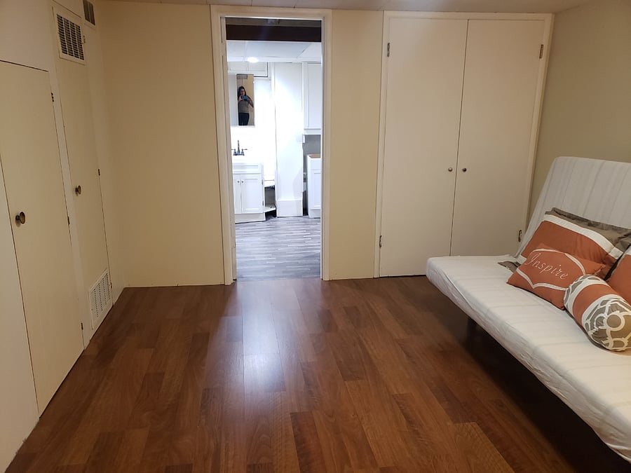 Furnished basement with futon, desk, full bathroom.