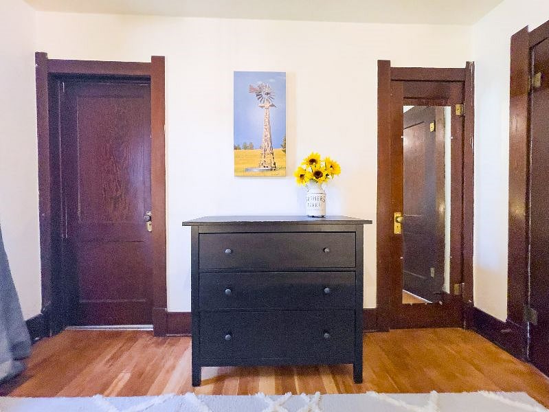 The king bedroom includes a dresser and closet. 