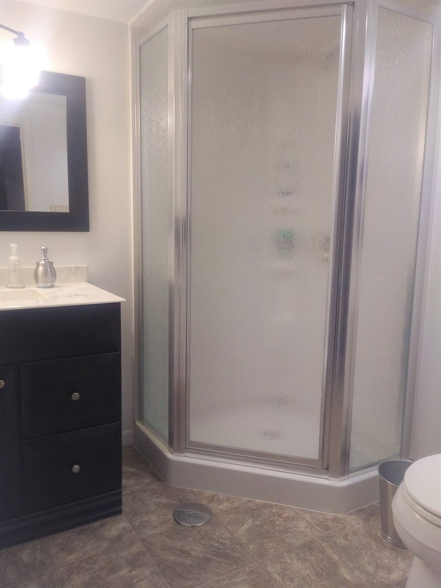 Bathroom with shower on lower level.