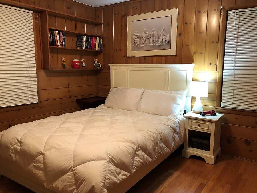 Knotty Pine bedroom full size bed.