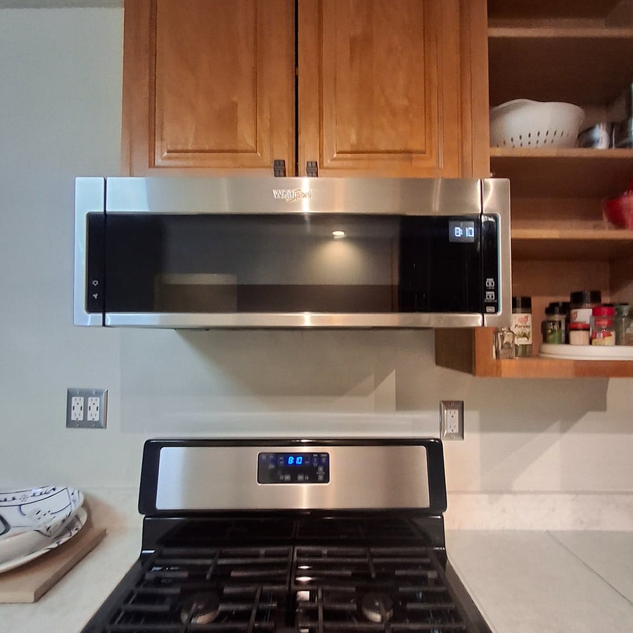 Microwave and gas stove.