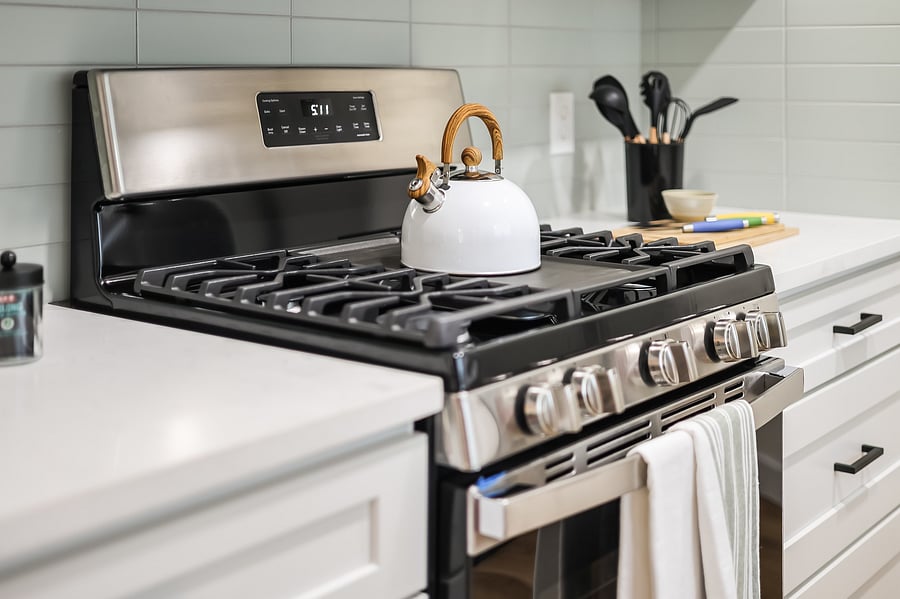 Kitchen - 5 burner stove with all the cooking amenities needed to cook delicious meals.