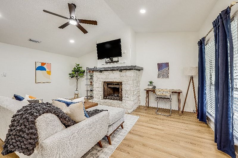 TV is mounted and can be pulled down for better eye level viewing.