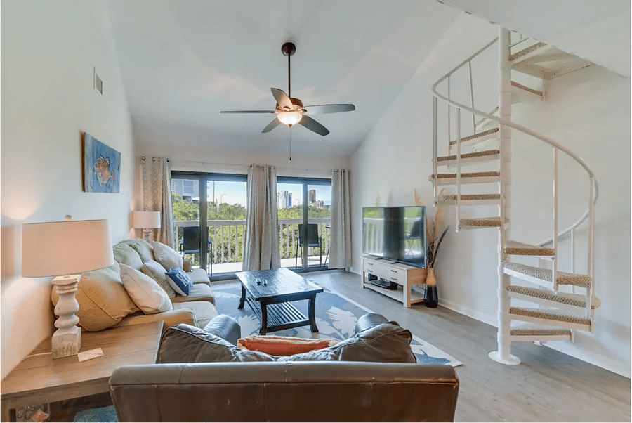 Living Room and stairs to the loft