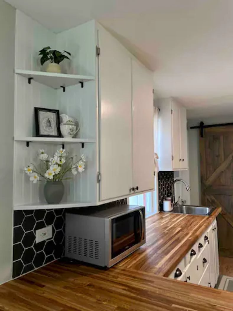 Ample counter and cupboard space for cooking needs.