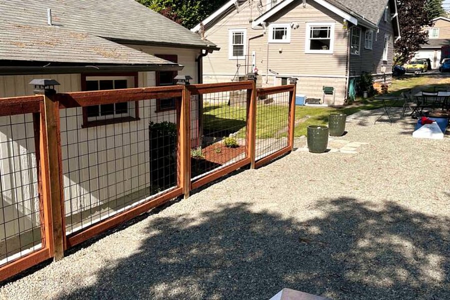Private driveway (and also room for cornhole!). Hosts' home in background.