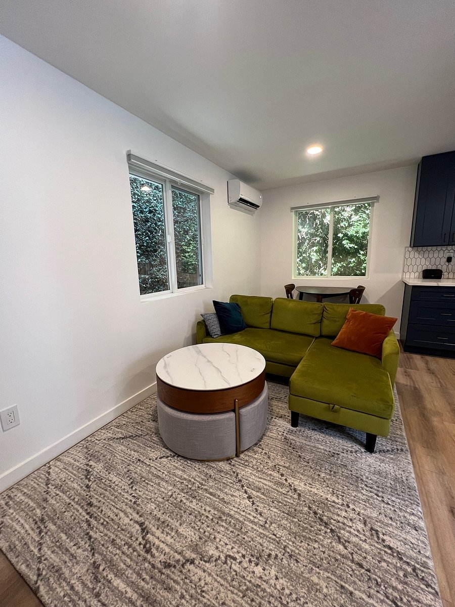 Couch features hidden storage and can also convert to a twin-sized bed. Coffee table top also lifts up with hidden storage inside. Four seats tuck into coffee table.