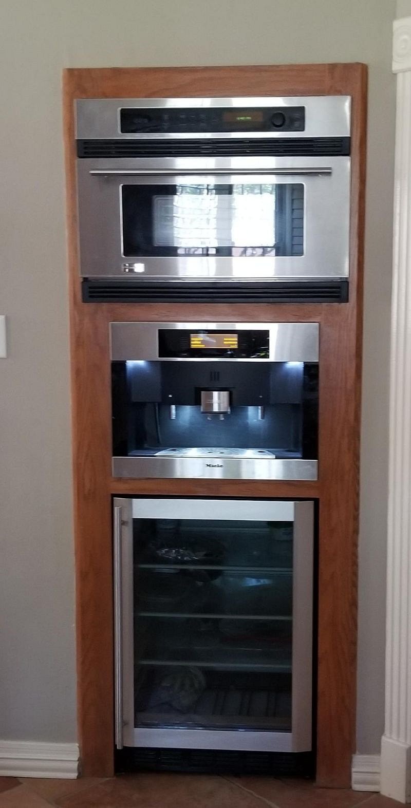Convection oven, espresso machine and small personal fridge.