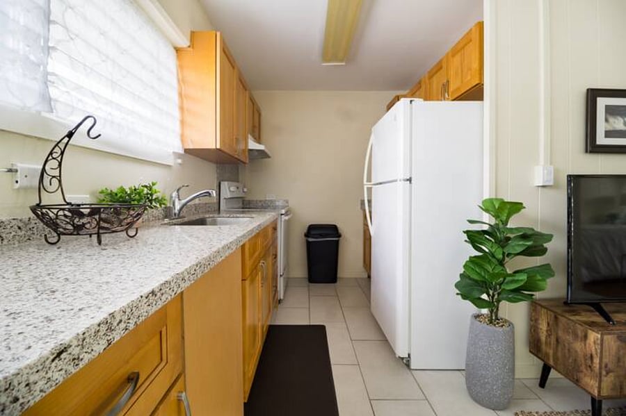 Plenty of counter space and cabinet storage. Ceramic stovetop & full-size oven. Full-size fridge & microwave provided.