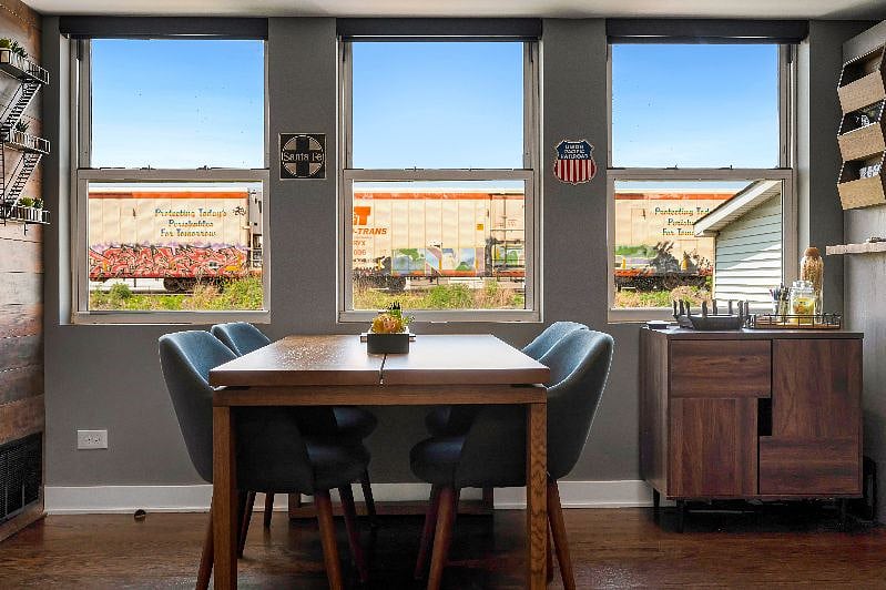 Watch powerful freight engines quietly roll by from the comfort of a chic dining room for a one-of-a-kind experience in Chicago.