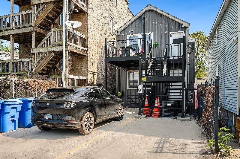 Easy private parking space at the base of the stairs to your unit (rear of the property, accessed via the alley). EV charger available for your electric vehicle (free electric, no additional charge)!