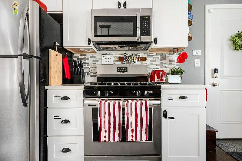 All the comforts of home built right in, with no details spared! Convenient labels to help you find what you need! Tastefully decorated space with custom reclaimed hardwood accents, pops of color, and comfy seating with tons of natural light.