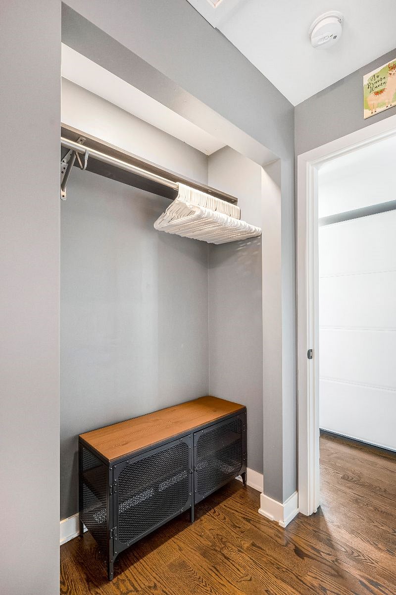 Tons of closet storage, cabinetry, and hangers in The Lounge.