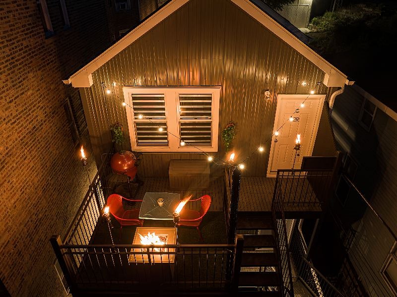 Your private evening oasis with plenty of fire! An incredibly peaceful reprieve from the hustle and bustle of the city, this patio feels like another world floating in a hodgepodge of forgotten urban infrastructure.