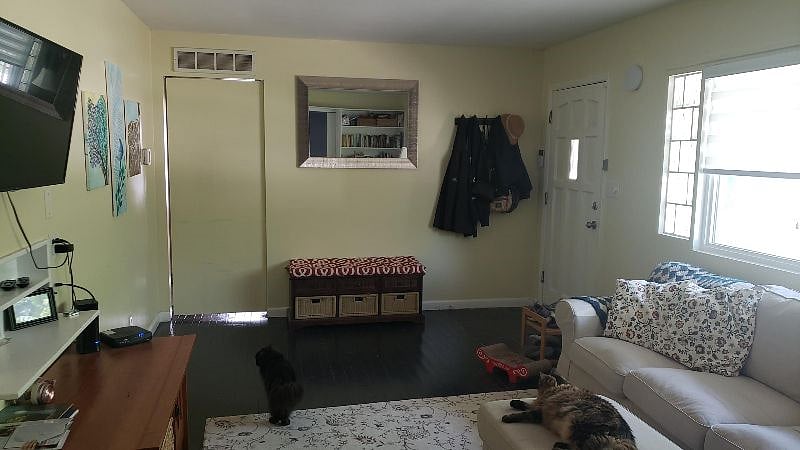Homeowner bedroom, office, bathroom on other side of door. Washer and dryer immediately inside door. This door is open almost all of the time.