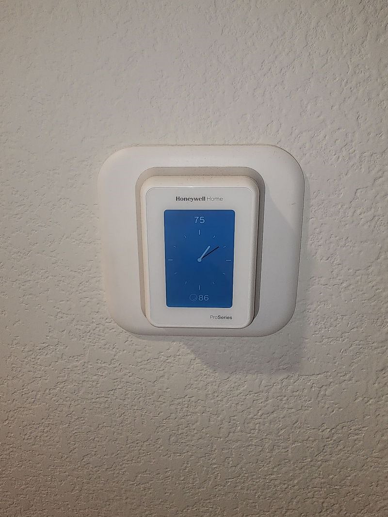 Smart thermostat. There is one on each floor.