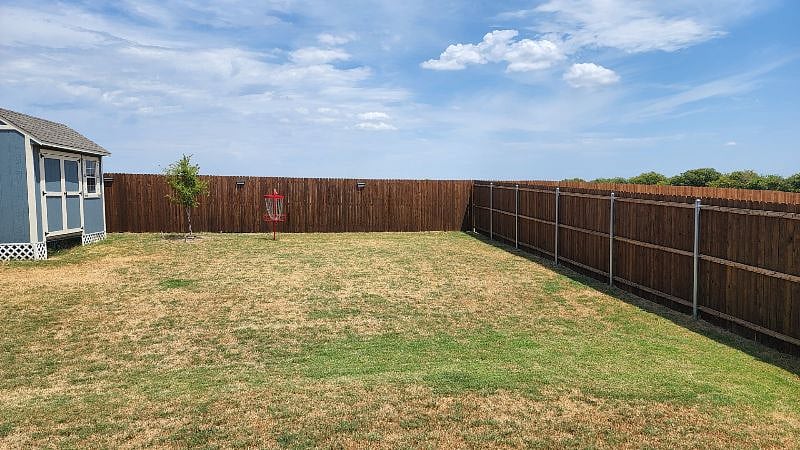 Backyard with frisbee golf basket with discs provided upon request. FYI, if you toss over the fence please walk around the house fence on the right to reach the disc in back of the house. Sorry, the shed is not avaiable for guests.