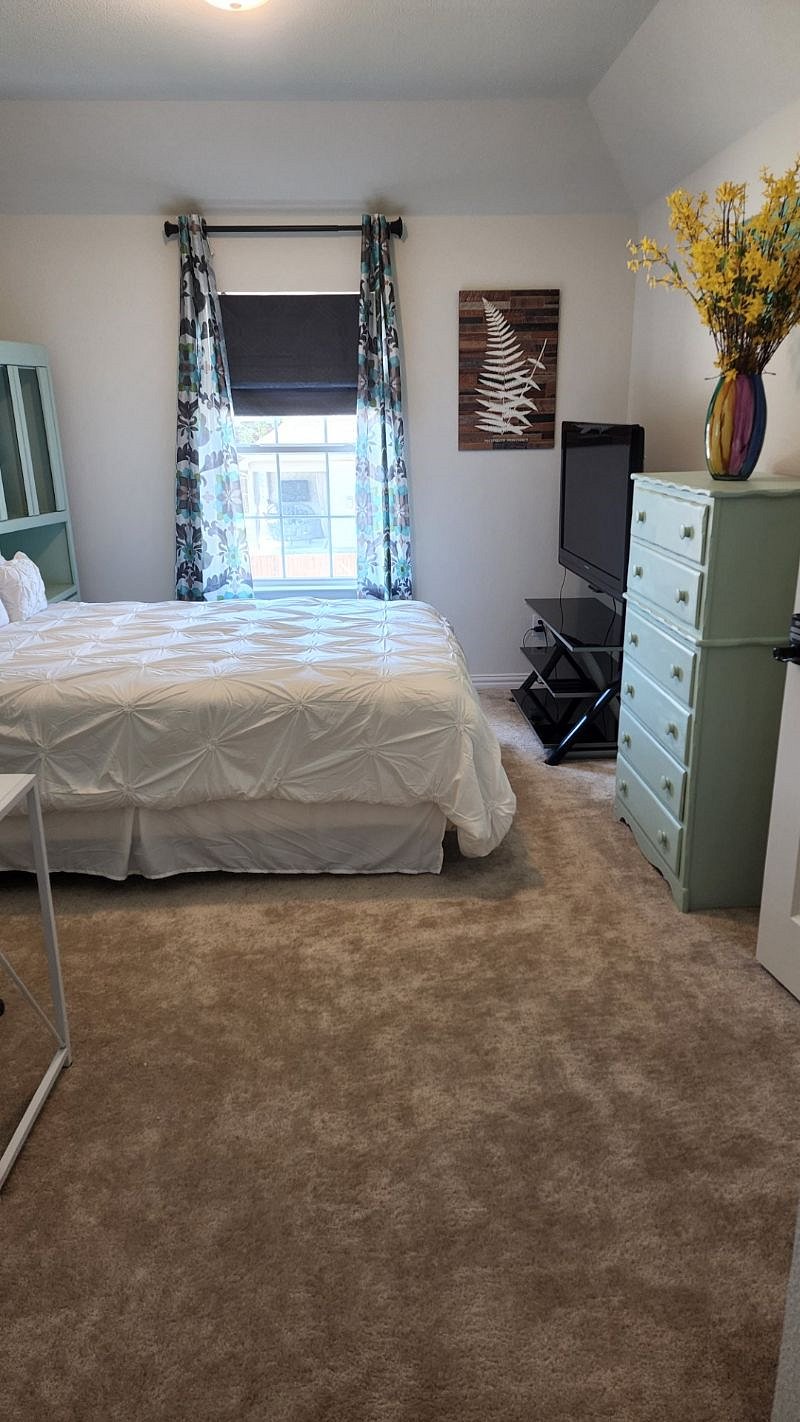 Bedroom Suite dresser, TV with stand, Googlechrome and blackout curtains.