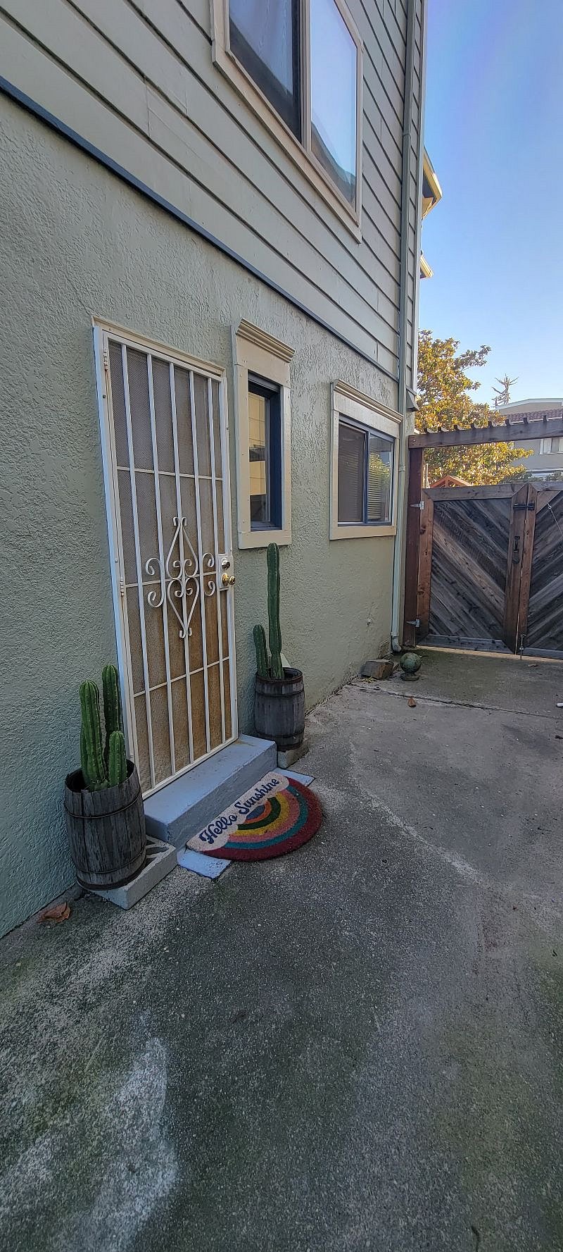Laundry room on ground floor behind gate to the front yard