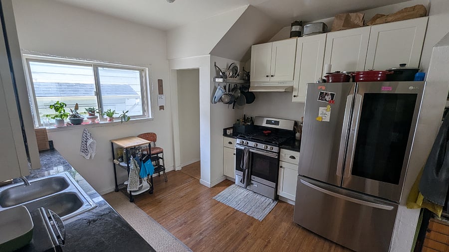 Kitchen - gas range, shared fridge