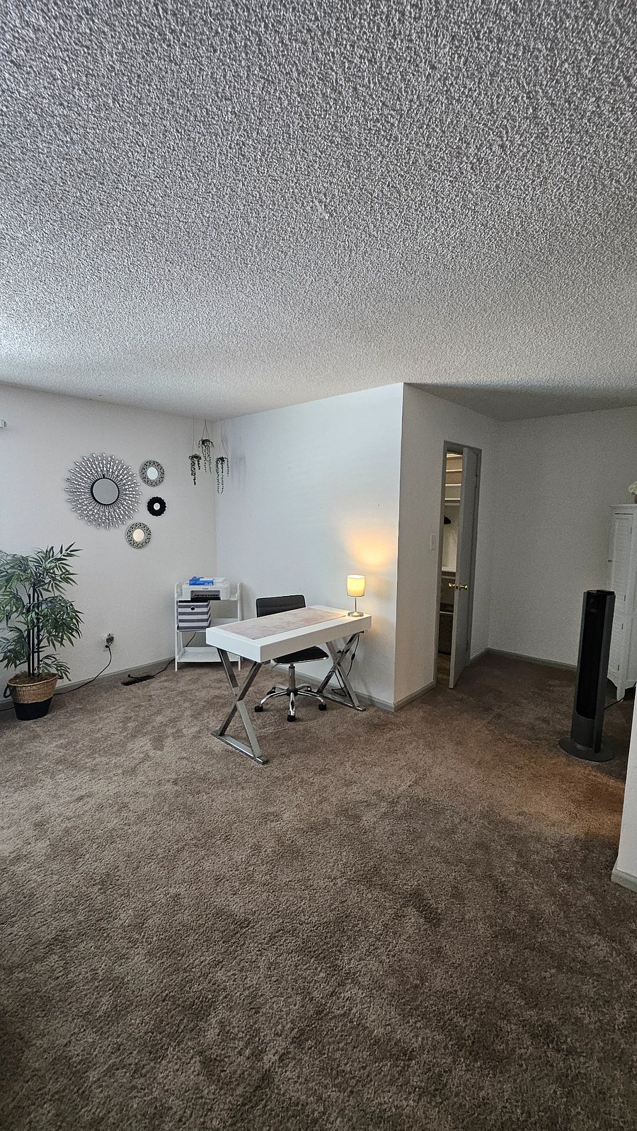 Extra large bedroom with desk.