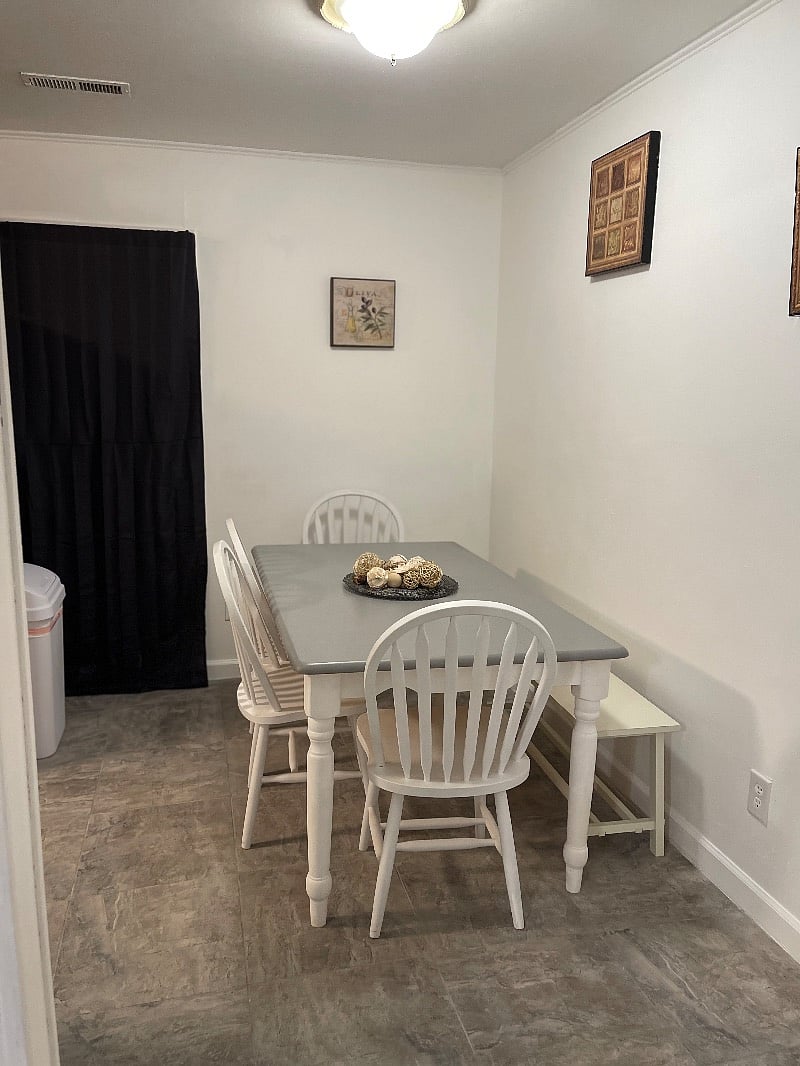 In kitchen dining area for six