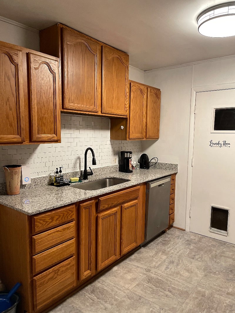 A combination pod and drip and pod coffee maker is provided along with a hot water kettle. The counters are granite and have a lot of space for meal prep. Tons of empty cabinet space for your groceries.