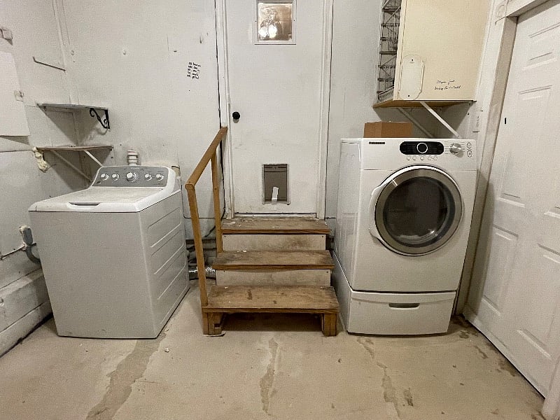 Right outside of the kitchen door is the laundry area. This is the part of the garage that is accessible to guests, the other half has a door with a security lock for maintenance and housekeeping access only.